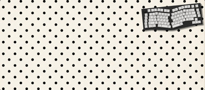 Keyboard on a pegboard with a white background