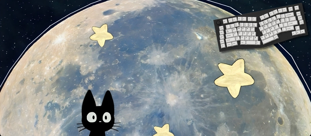 Black cat, stars, and keyboard on a moon surface
