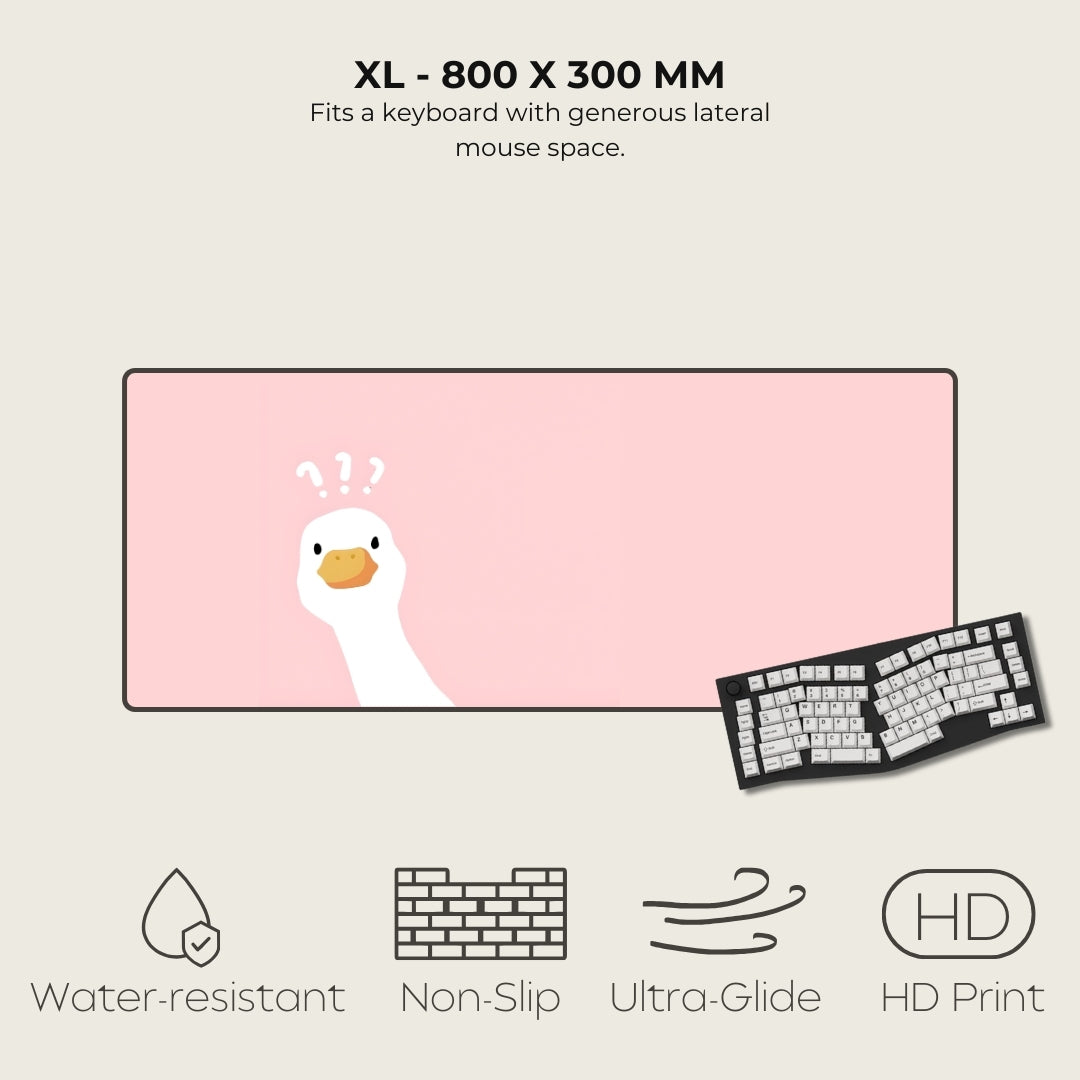 Large pink mouse pad with a cartoon duck design, featuring text and icons indicating product features.