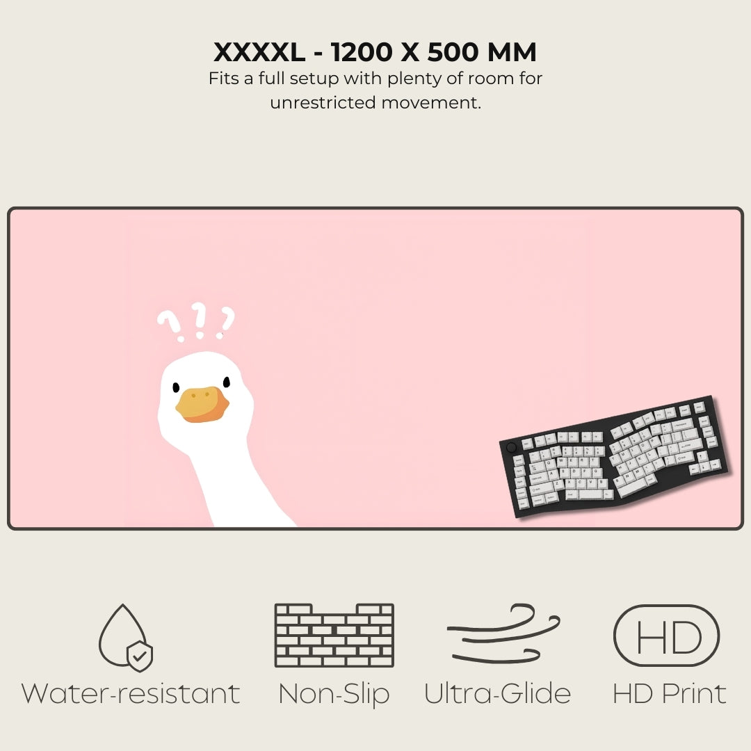 Large pink mouse pad with cartoon duck and keyboard illustration, featuring text and icons indicating product features.