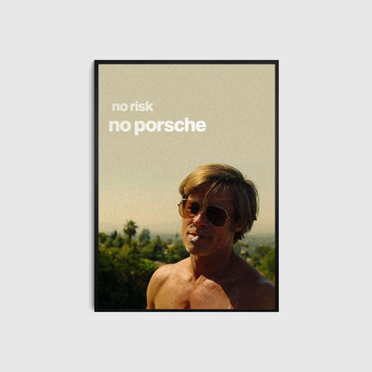 Framed poster with a person wearing sunglasses and text 'no risk no porsche' on a scenic background.