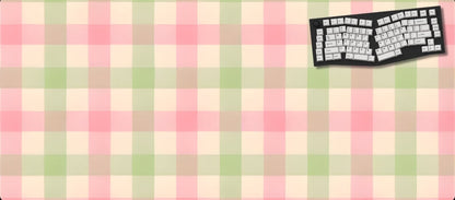 Checkered mouse pad with a keyboard design on a black background