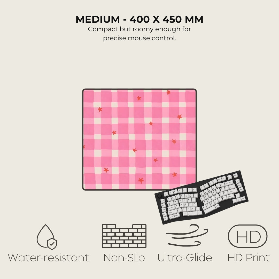 Pink checkered mouse pad with text and icons on a light gray background