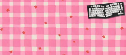 Pink checkered mouse pad with small red stars and a black and white keyboard graphic.