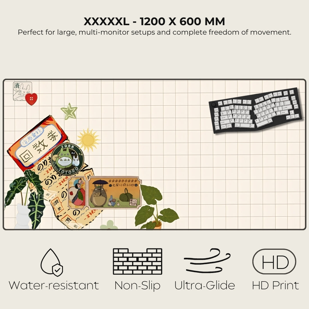 Large desk mat with decorative elements and a keyboard, featuring text about size and features.