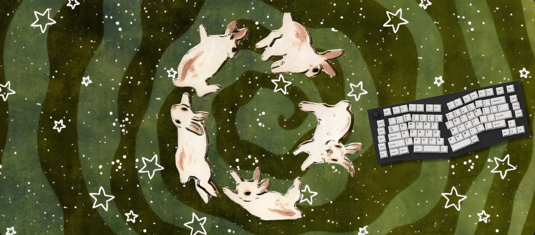 Feline-themed mouse pad with cats and a keyboard on a starry night design.