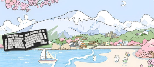 Keyboard with a scenic beach and mountain background