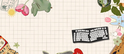 Keyboard on a grid background with cartoon elements and stationery items.