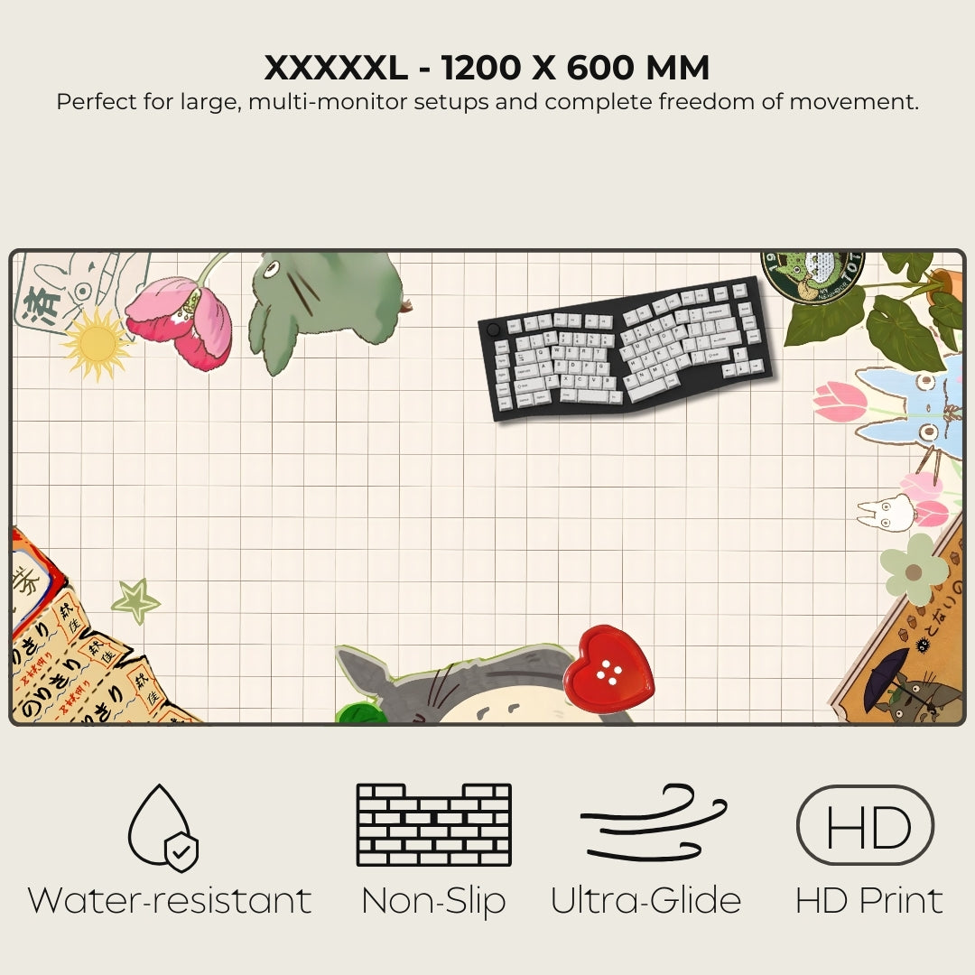 Large desk mat with cartoon designs and keyboard, featuring text on size and features.