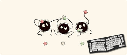 Three cartoon characters with long eyelashes on a white background with a keyboard.