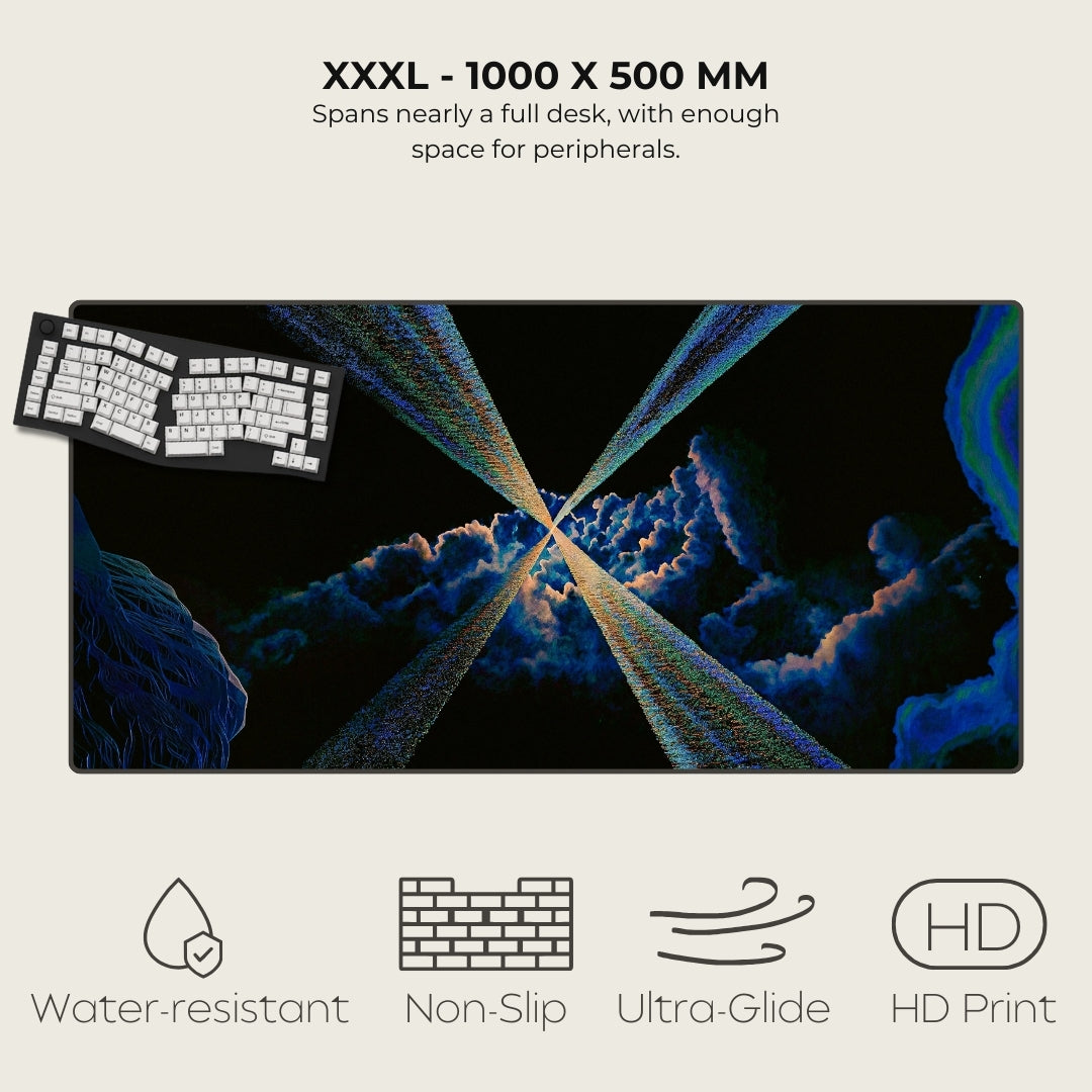 Large desk mat with fractal design and keyboard, featuring text and icons about product dimensions and features.