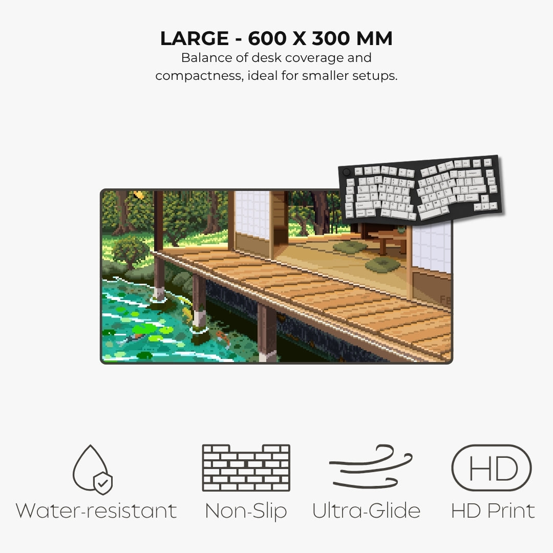A large desk mat featuring a pixel art style illustration of a wooden deck and pond, shown with text highlighting its 600 x 300 mm size and features like water resistance, non-slip texture, ultra-glide edge, and high-definition print.