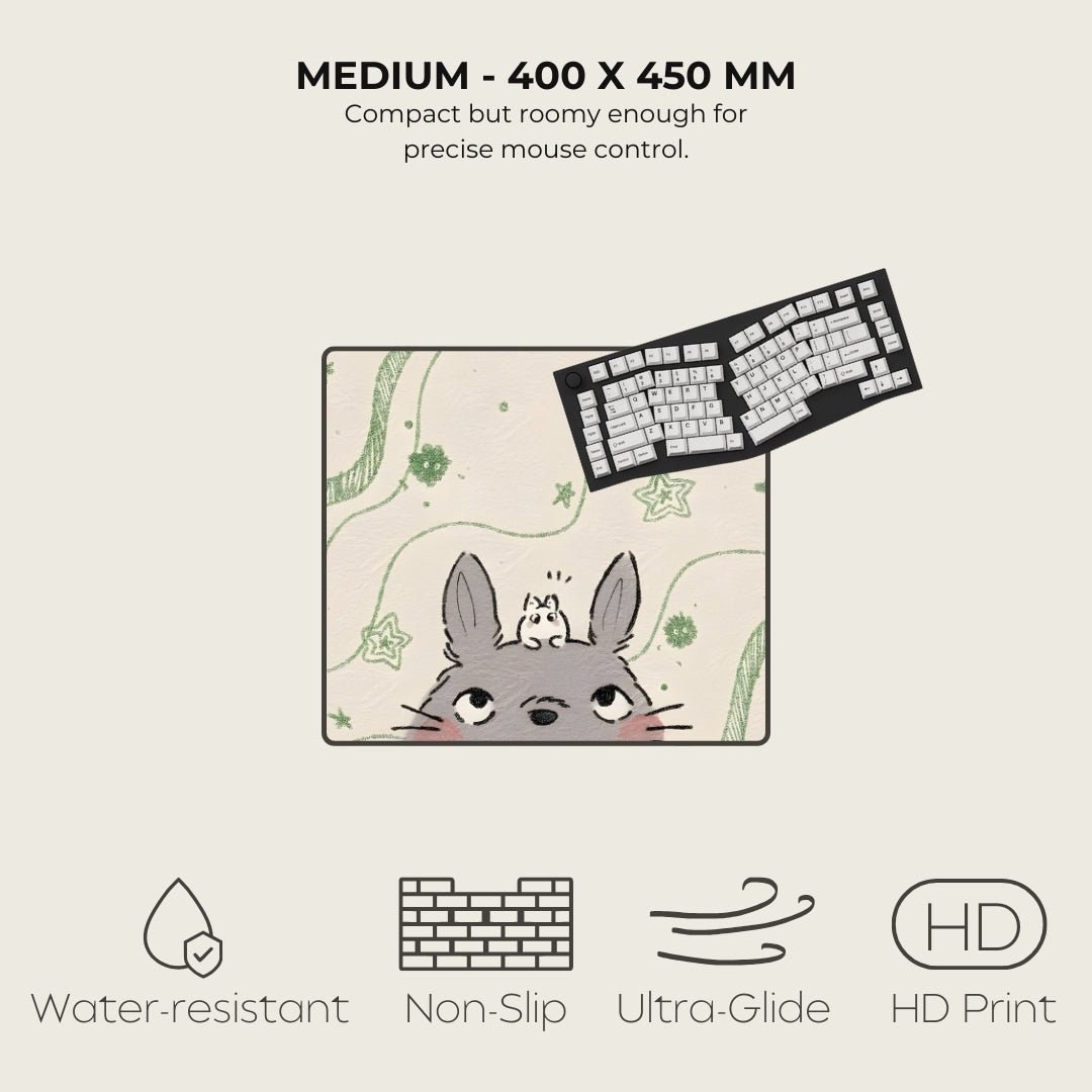 Mouse pad with cartoon character and keyboard on a light background, featuring text and icons about product specifications.