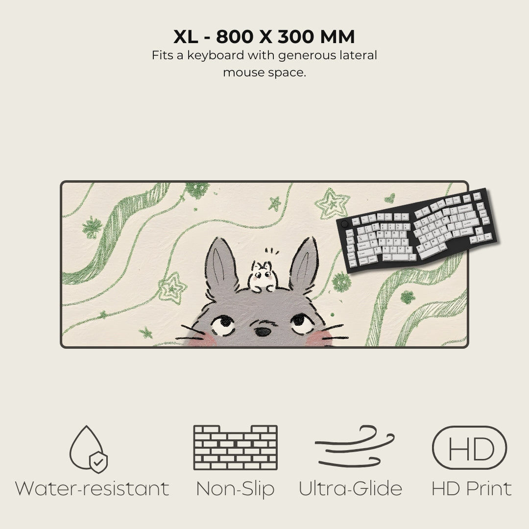 Large mouse pad with cartoon character design, featuring a keyboard on top.