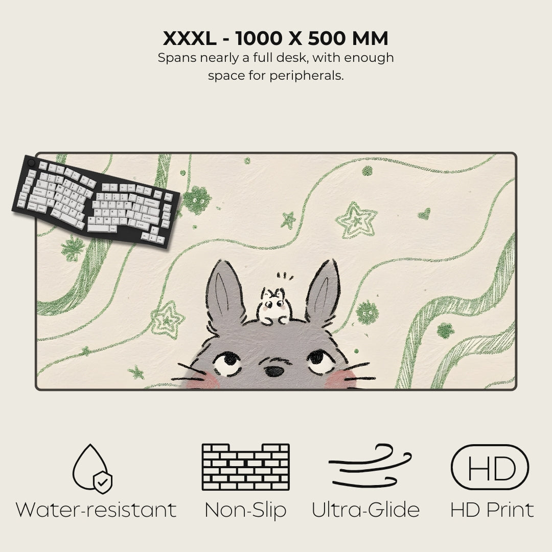 Large mouse pad with cartoon character design, keyboard on top, and product features listed.