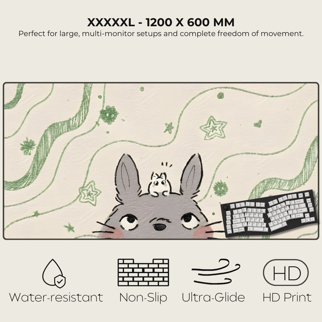 Large desk mat with cartoon character and keyboard, featuring text and icons indicating product features.