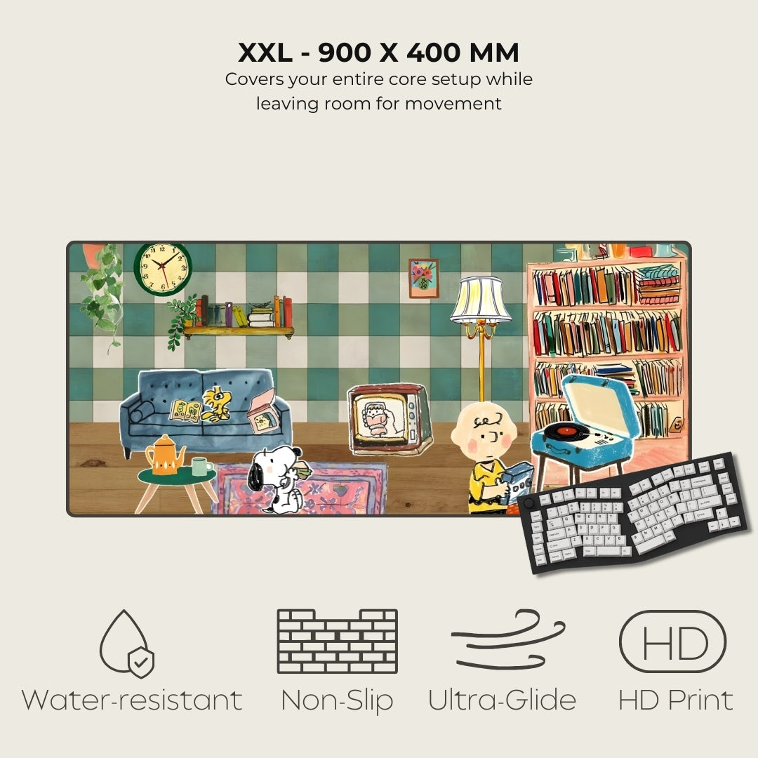 Large mouse pad with cartoon design of a living room scene, featuring a couch, lamp, and books.