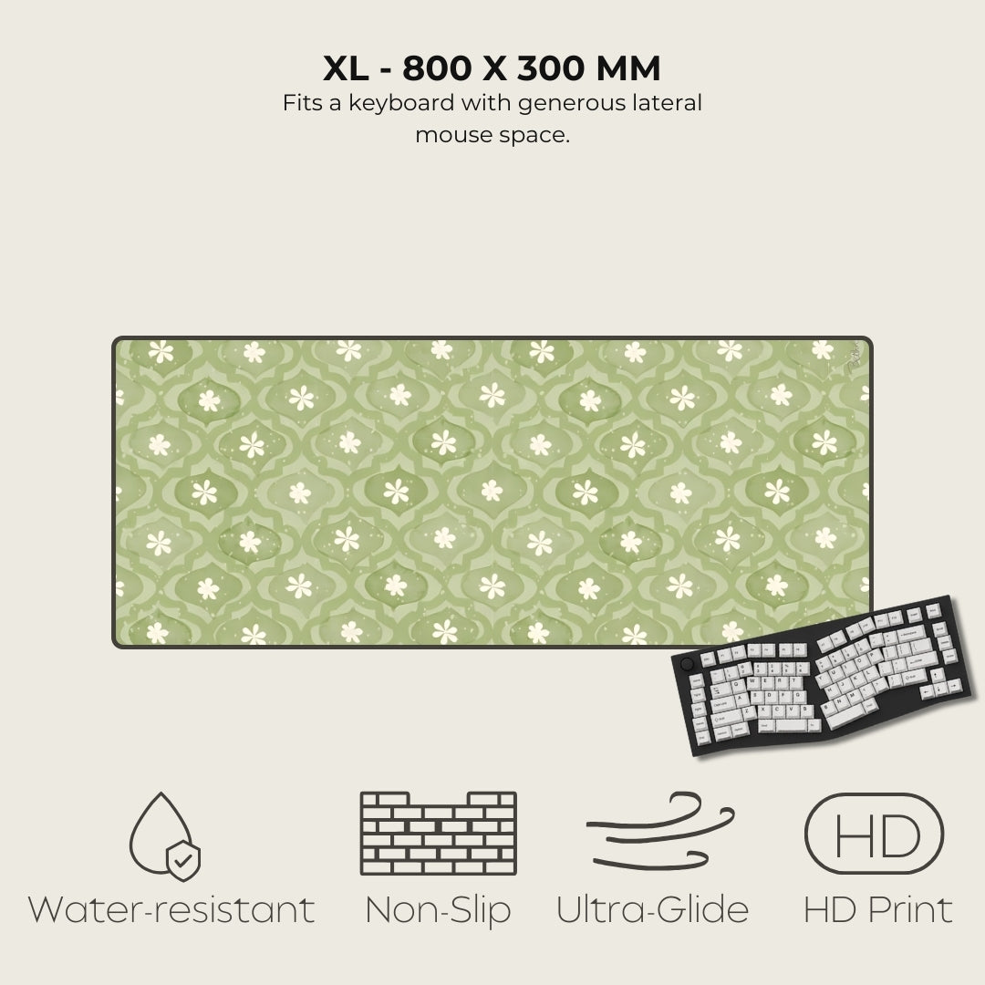 Green patterned mouse pad with keyboard on a beige background