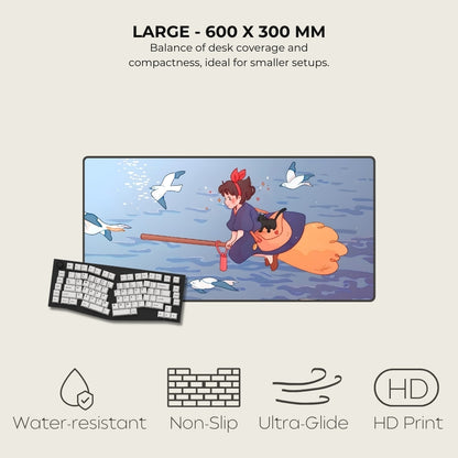 Desk mat with cartoon design of a person on a broomstick with birds, next to a keyboard, on a light gray background.