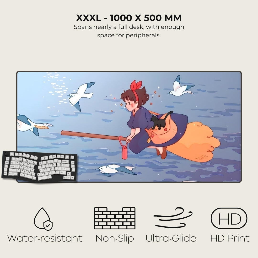 Large cartoon mural of a girl on a broomstick with birds, next to a keyboard and mouse pad, on a light gray background.