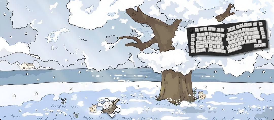 Winter scene with a tree and keyboard on a snowy landscape