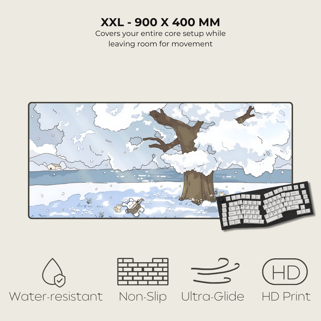 Large mouse pad with a winter scene design, featuring a keyboard on a light gray background.