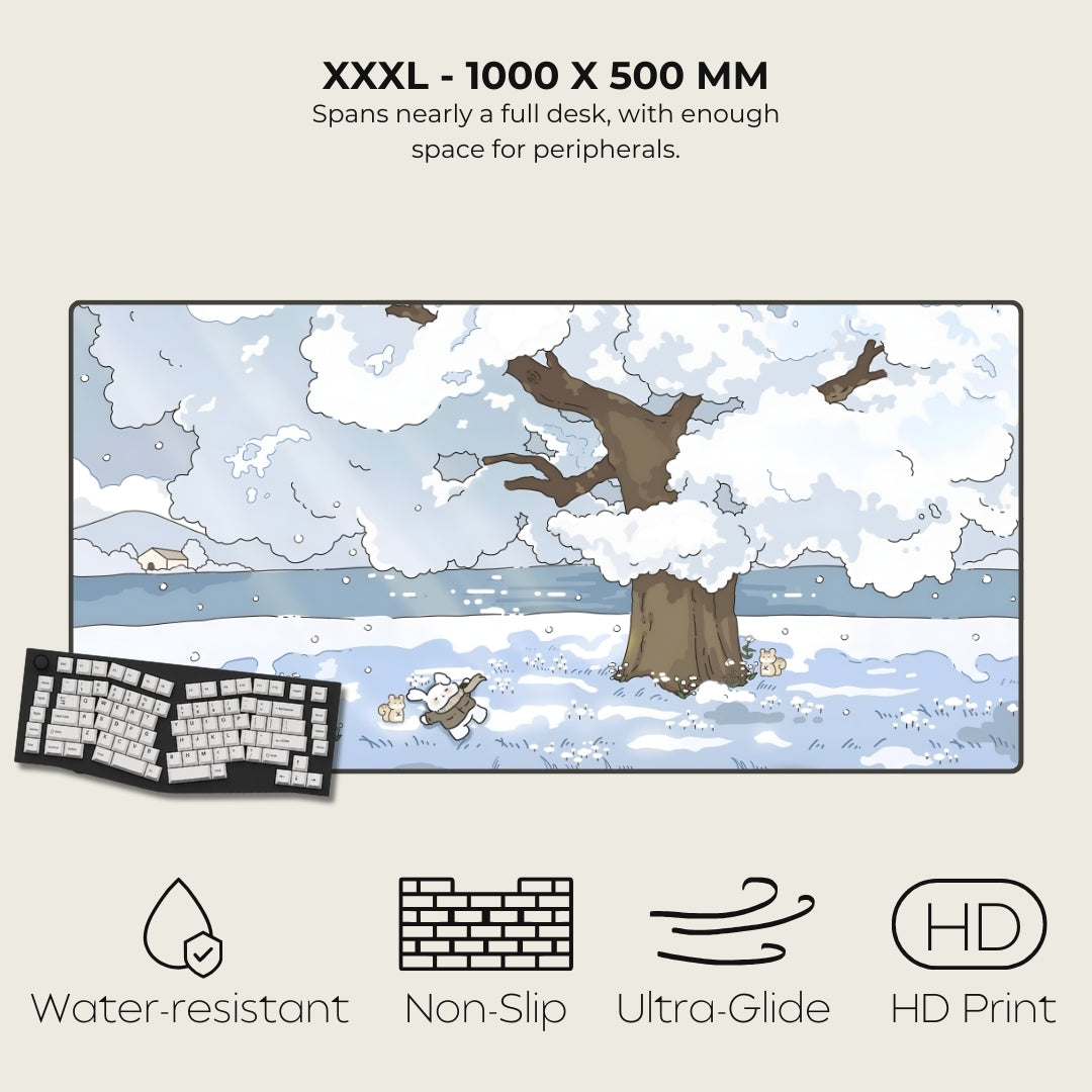 Large desk mat with winter scene design, keyboard on the left, and product features listed.