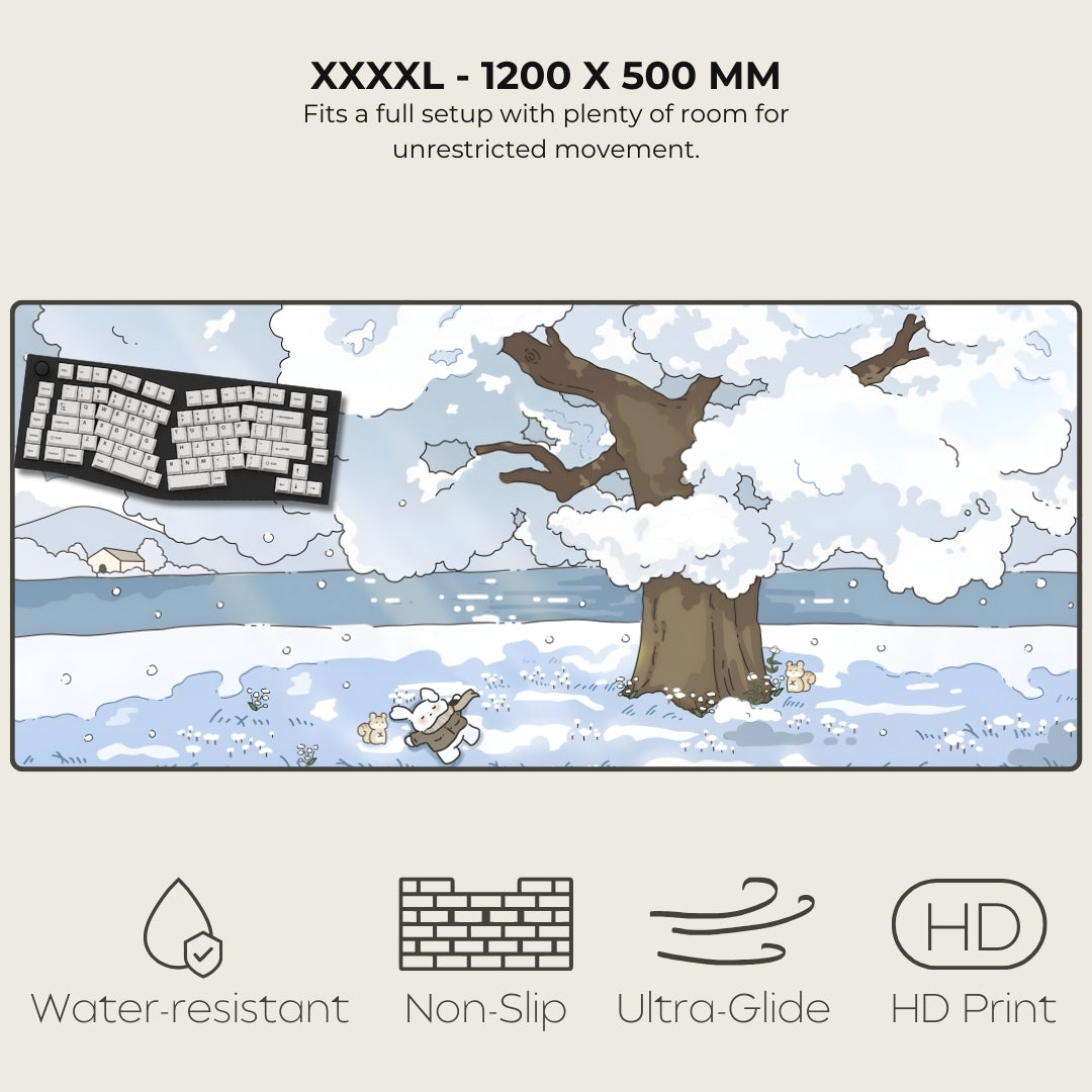 Large mouse pad with winter design featuring a tree and snow, with text and icons indicating features.