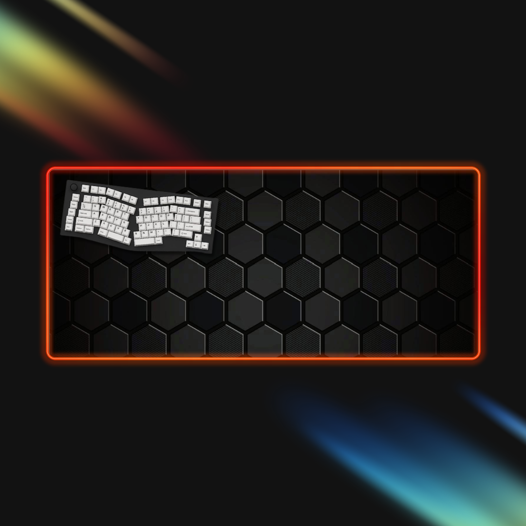 Gaming keyboard with hexagonal pattern and rgb border on a dark background
