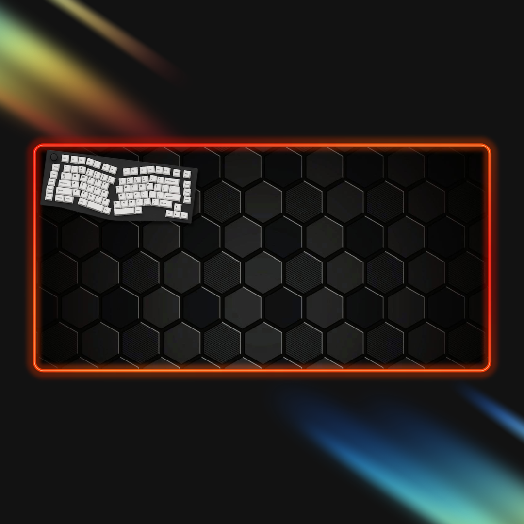 Hexagonal patterned mouse pad with rgb border and keyboard model on a dark background